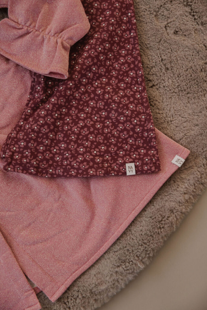 Be flared burgundy leopard flower
